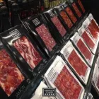 La imagen 26 de la Empresa ENRIQUE TOMÁS JAMON-TAPAS-VINO Tienda de comestibles gourmet en Santiago de Surco LAM