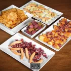 La imagen 37 de la Empresa ENRIQUE TOMÁS JAMON-TAPAS-VINO Tienda de comestibles gourmet en Santiago de Surco LAM